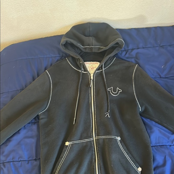 Black true religion jacket with white stitching